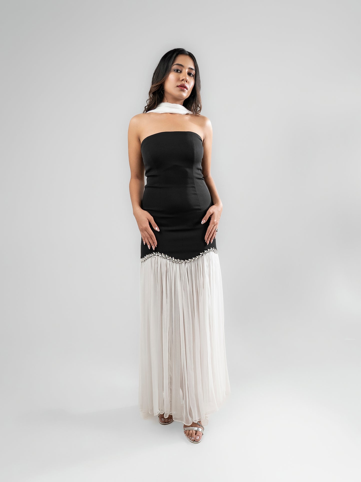 Parisienne - A long dress with intricate stone detailing, a sheer flared bottom, and a matching stole