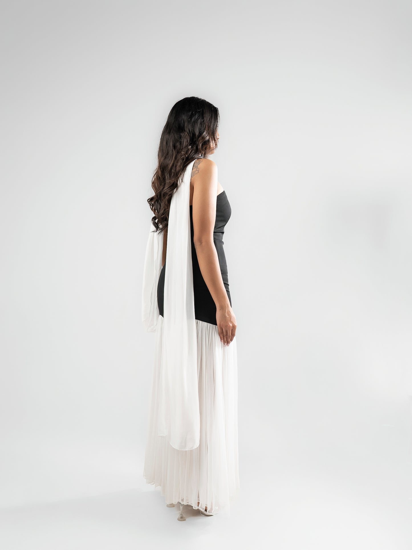 Parisienne - A long dress with intricate stone detailing, a sheer flared bottom, and a matching stole