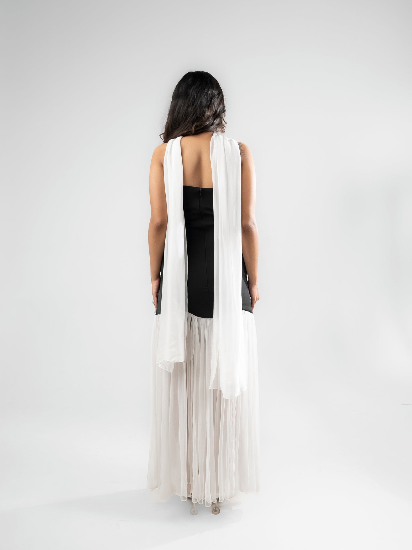 Parisienne - A long dress with intricate stone detailing, a sheer flared bottom, and a matching stole