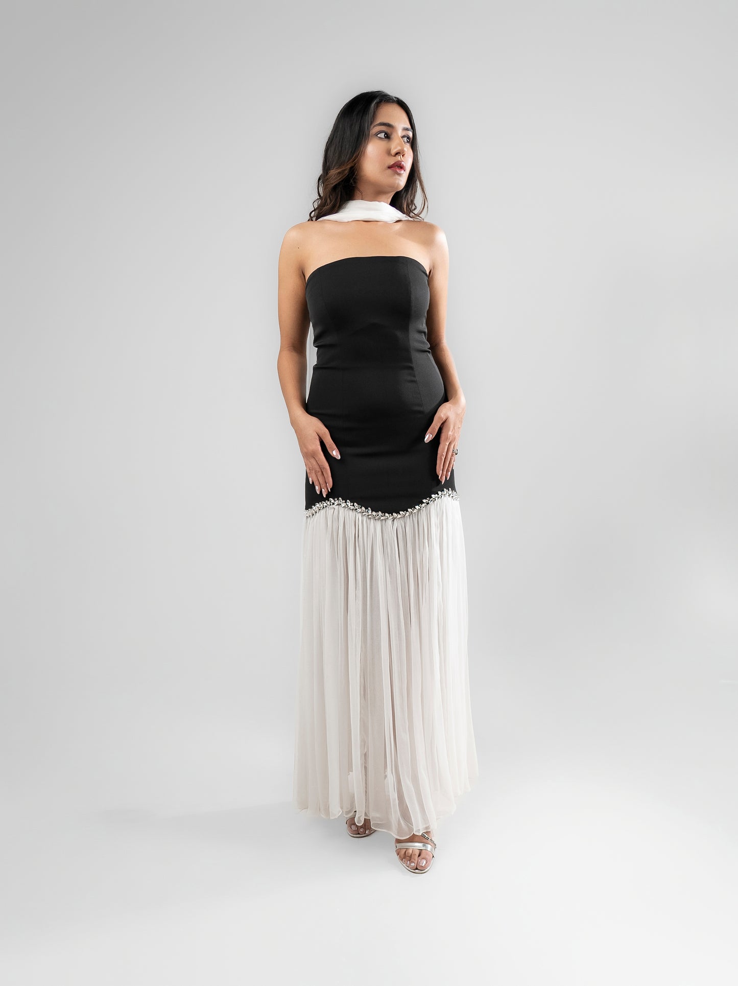Parisienne - A long dress with intricate stone detailing, a sheer flared bottom, and a matching stole
