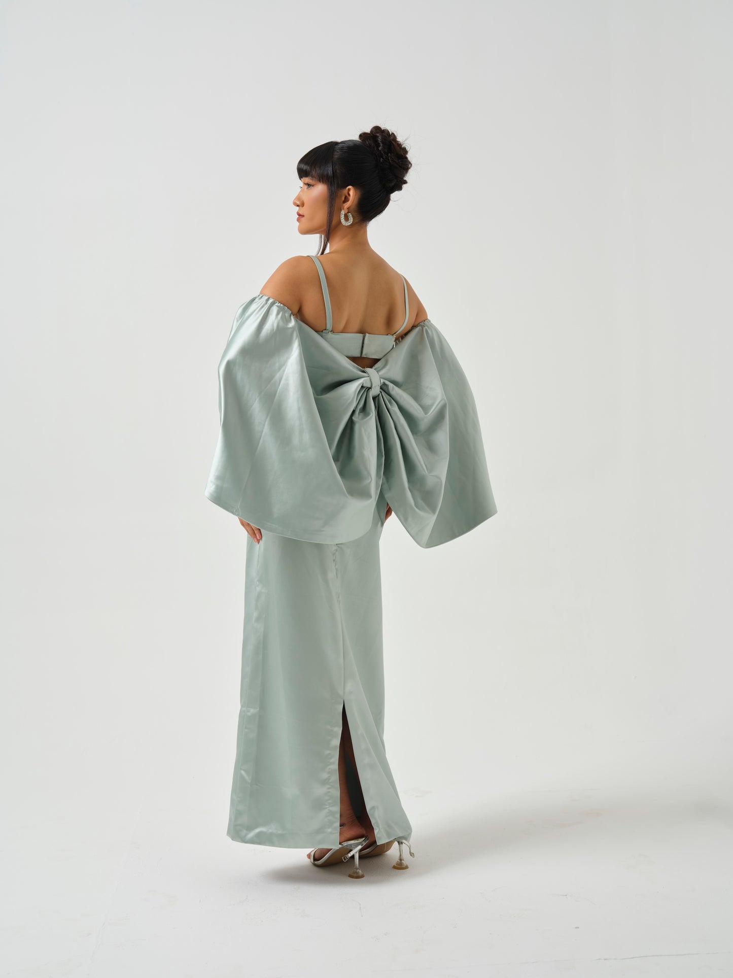 INAAYA- A heavily embroidered blouse paired with skirt and bow