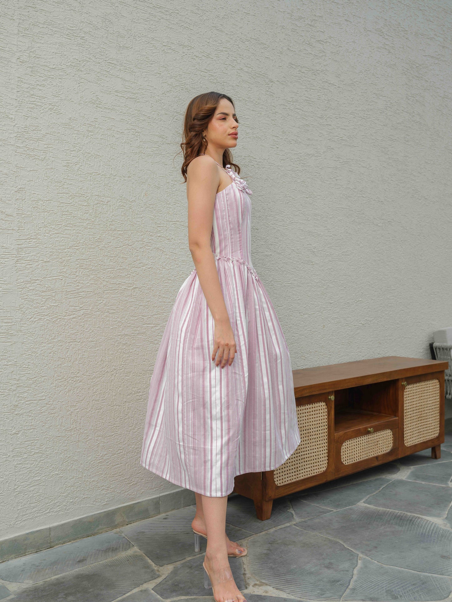 ZIME – A halterneck corset dress featuring fabric flower detailing on the top
