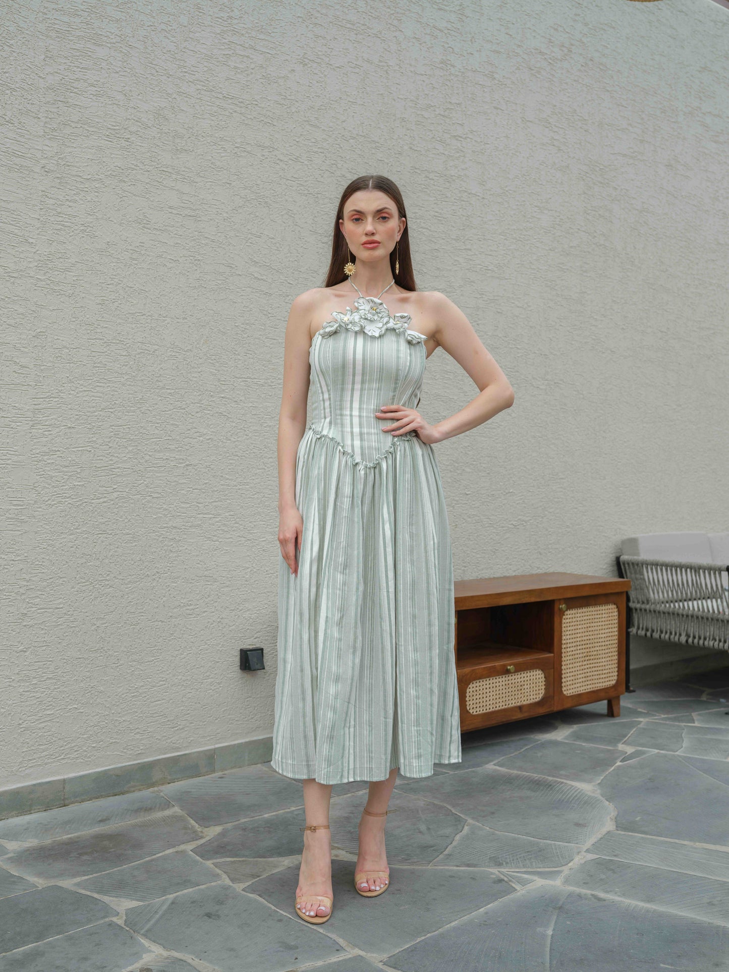 DAISY – A halterneck corset dress featuring fabric flower detailing on the top