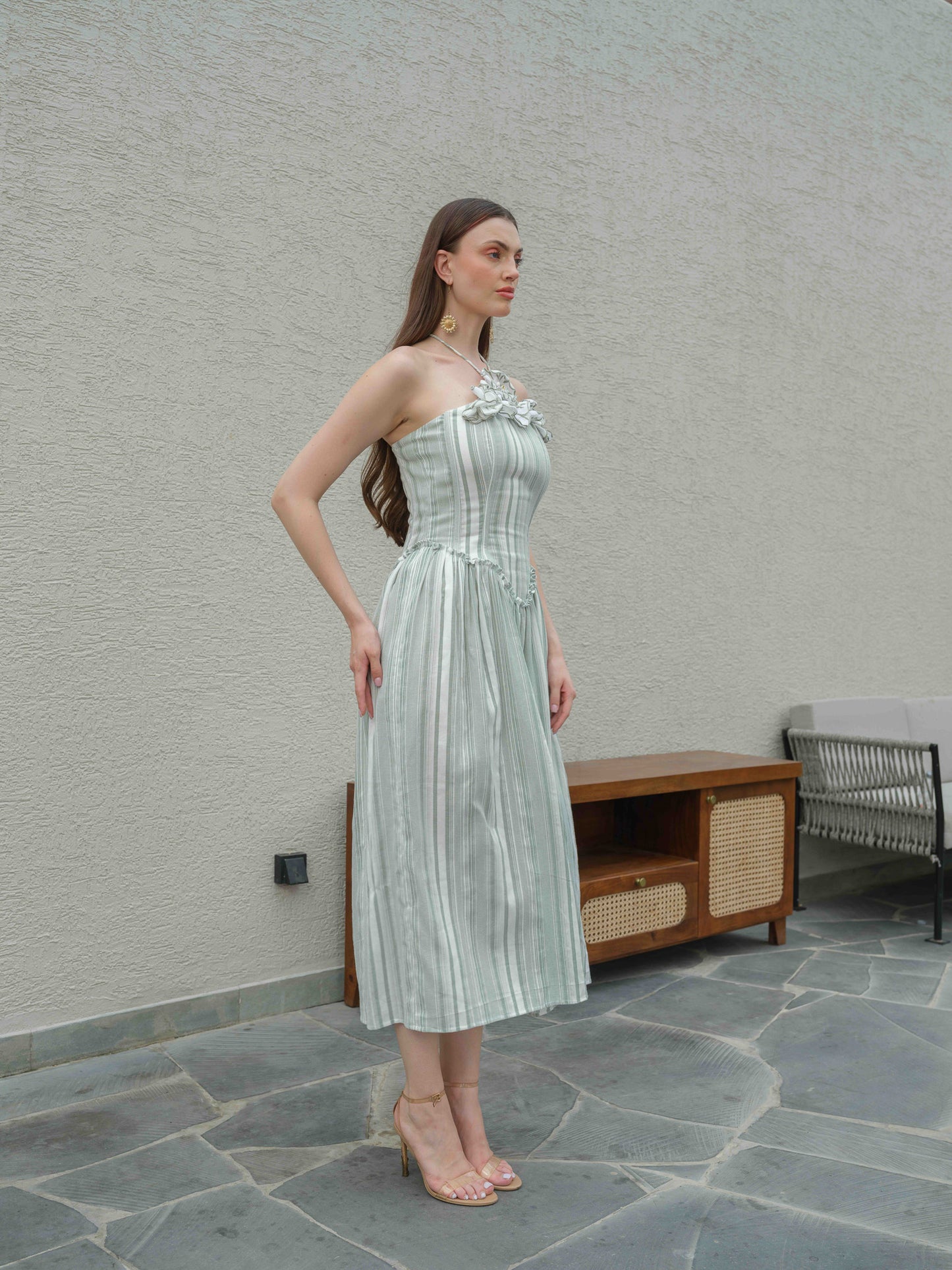 DAISY – A halterneck corset dress featuring fabric flower detailing on the top