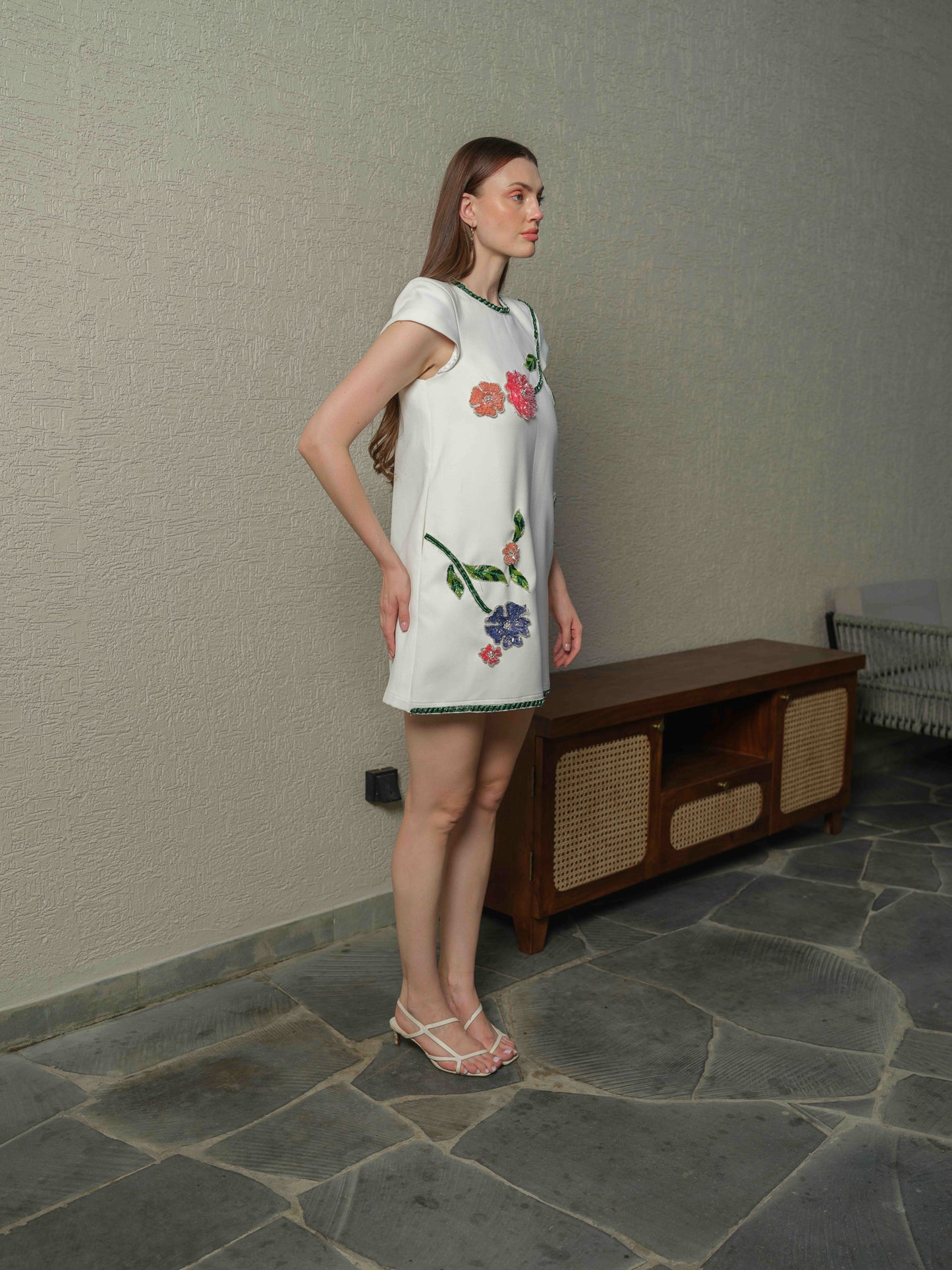 VENICE – A white box-fit dress featuring exquisite applique work with 3D embroidery.