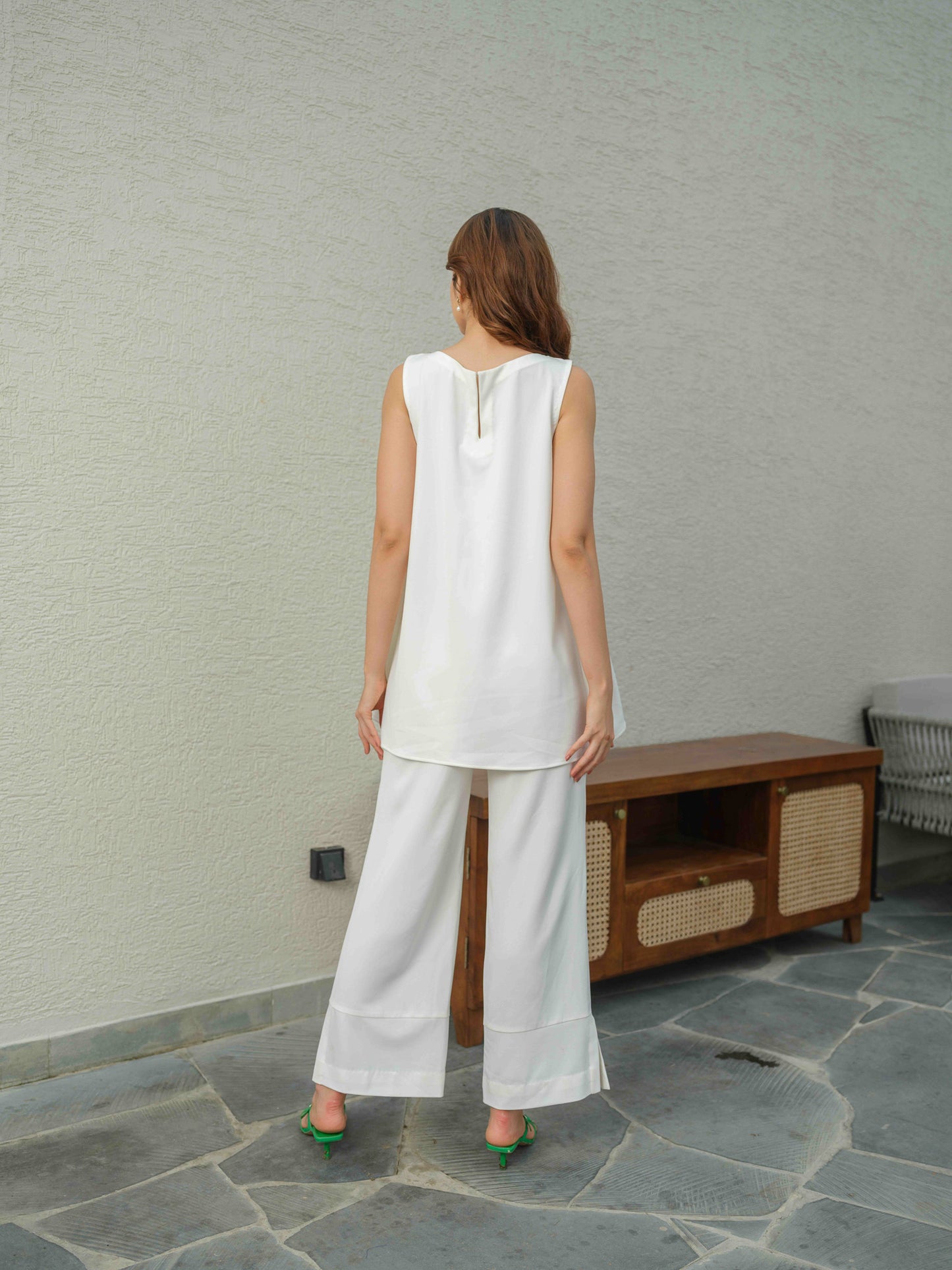 HAZEL – A co-ord set with an up-and-down top featuring applique work and 3D embroidery, paired with flared pants