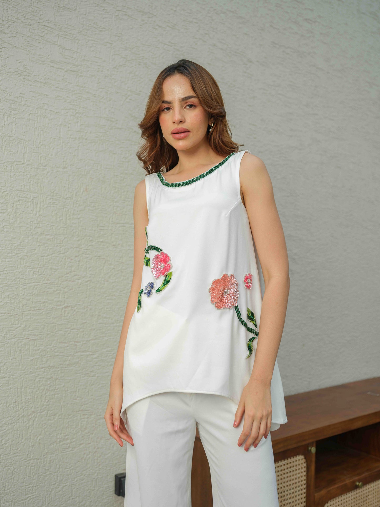 HAZEL – A co-ord set with an up-and-down top featuring applique work and 3D embroidery, paired with flared pants