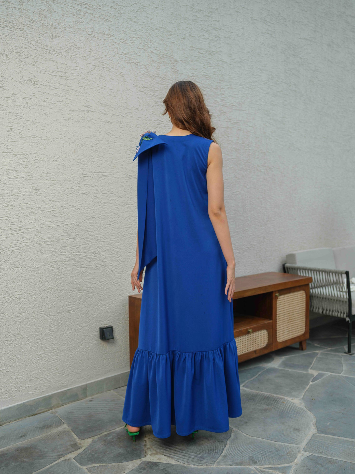 CARLA – An electric blue dress featuring bow detailing on the shoulder