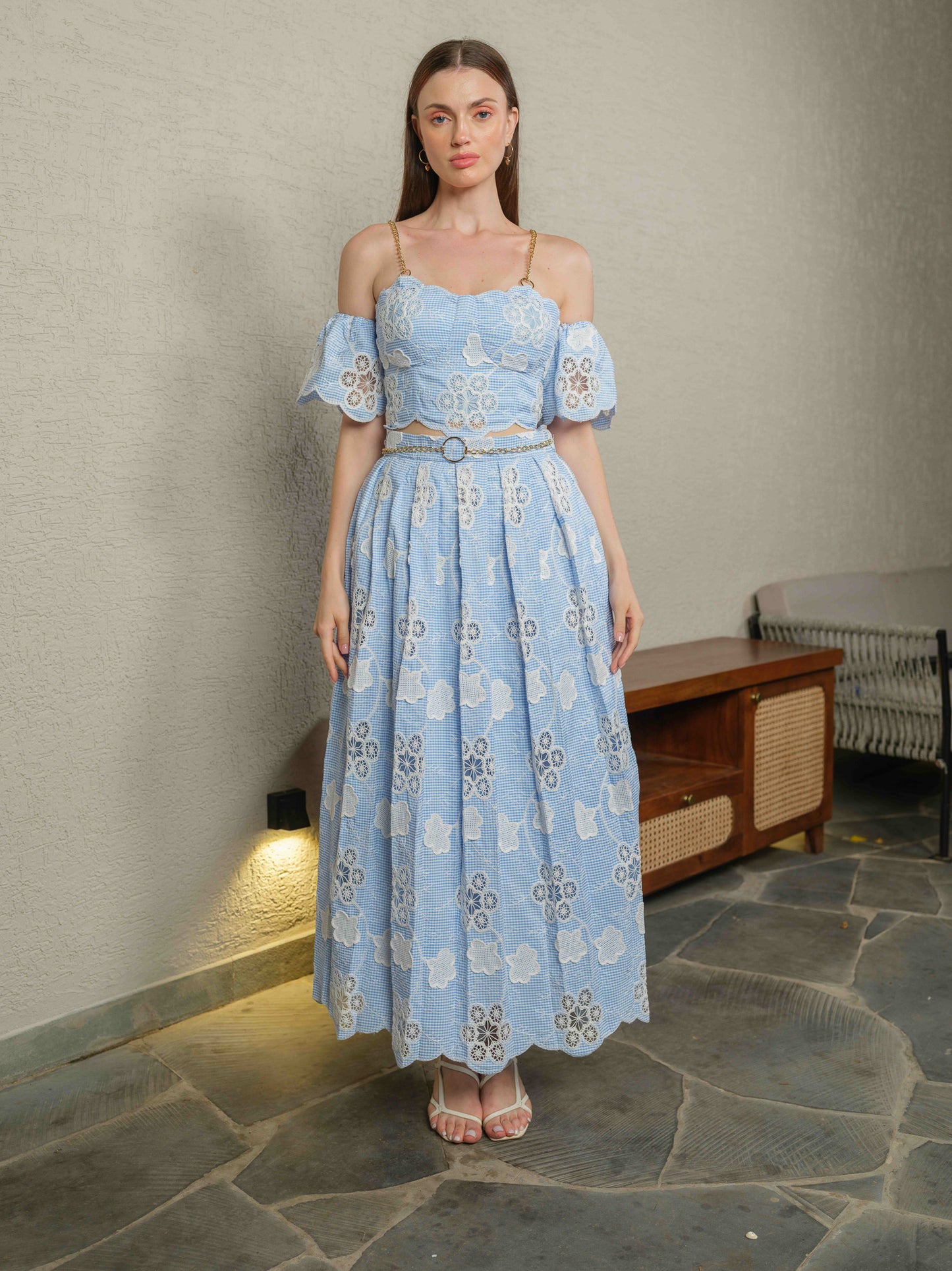 FLORESSA –corset with chain detailing, paired with a pleated skirt and detachable sleeves