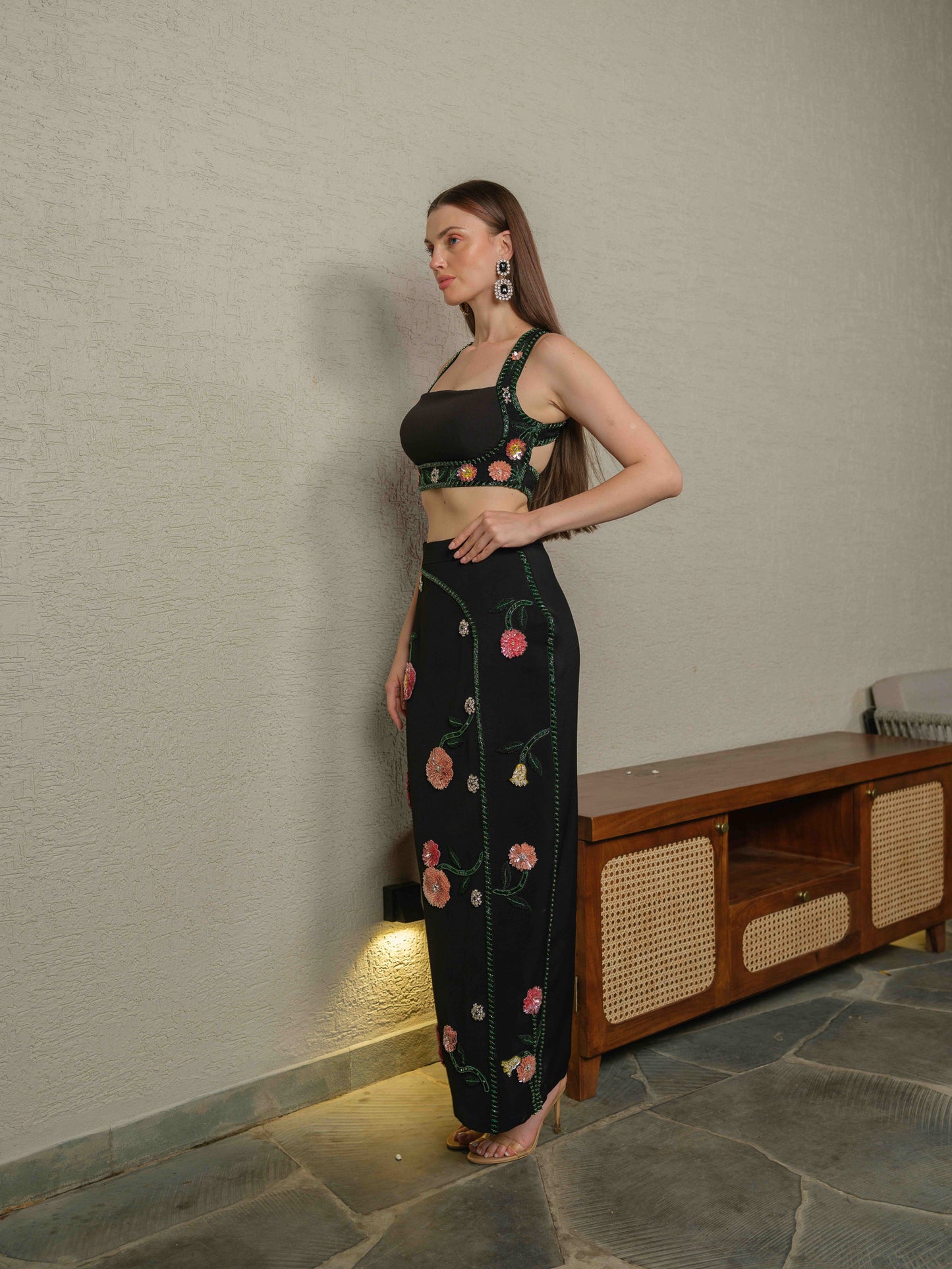 OBSCURA – Tube top with embroidery paired with a structured skirt featuring 3D embroidered detailing.