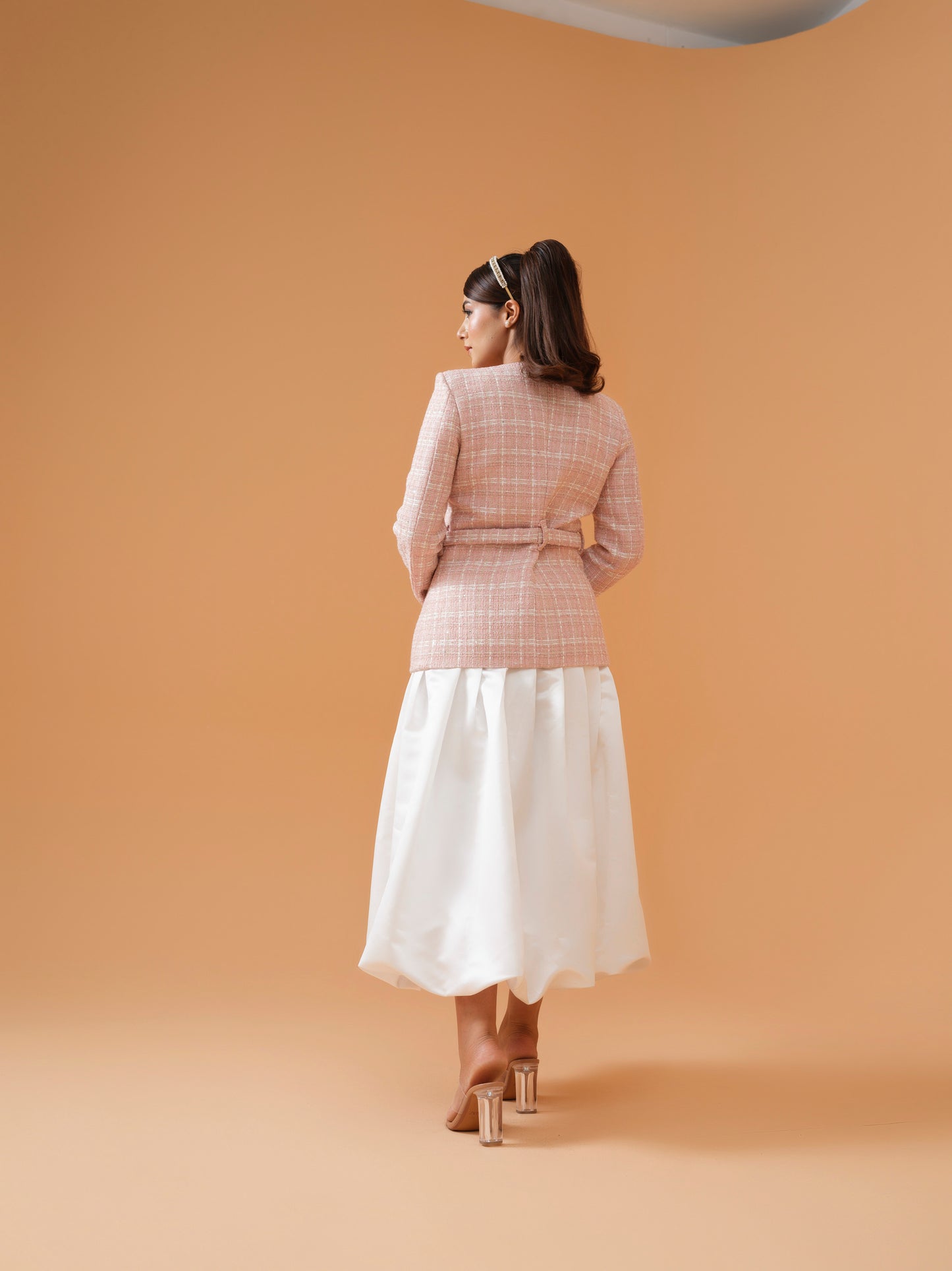 Supriya Nagpal in Nora - co-ord set with belted jacket and balloon skirt