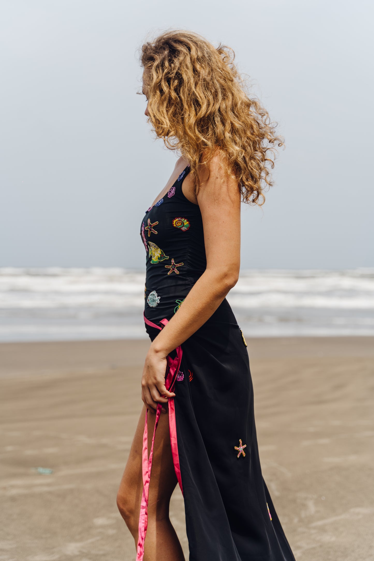AQVI- Black bodysuit adorned with intricate embroidery of aquatic motifs