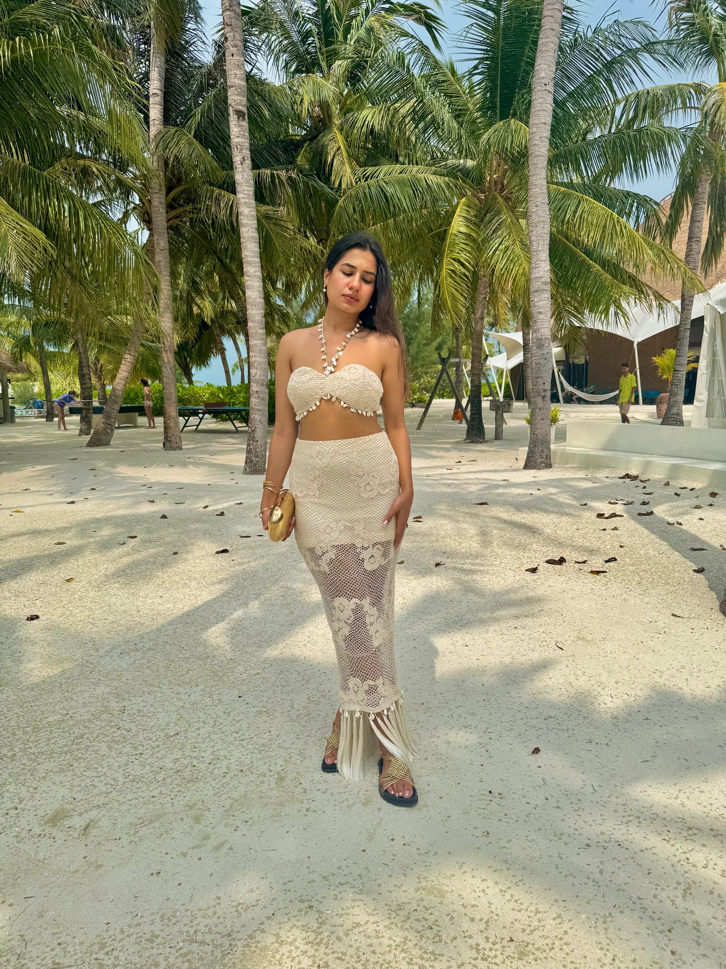 COVE– Crochet co-ord with a Kodi-detailed tube top paired with a pencil-fit skirt