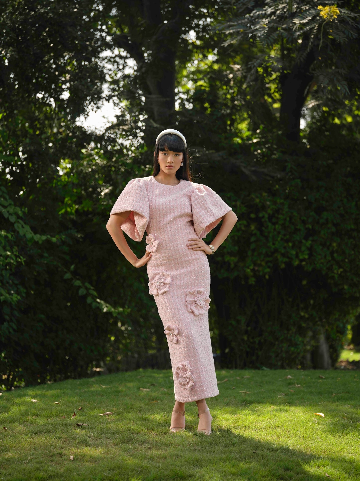 AURELIA- A Long dress with flower detailing.