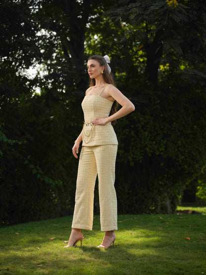 MARBELLA- Corset top with  metal detailing paired with straight pants