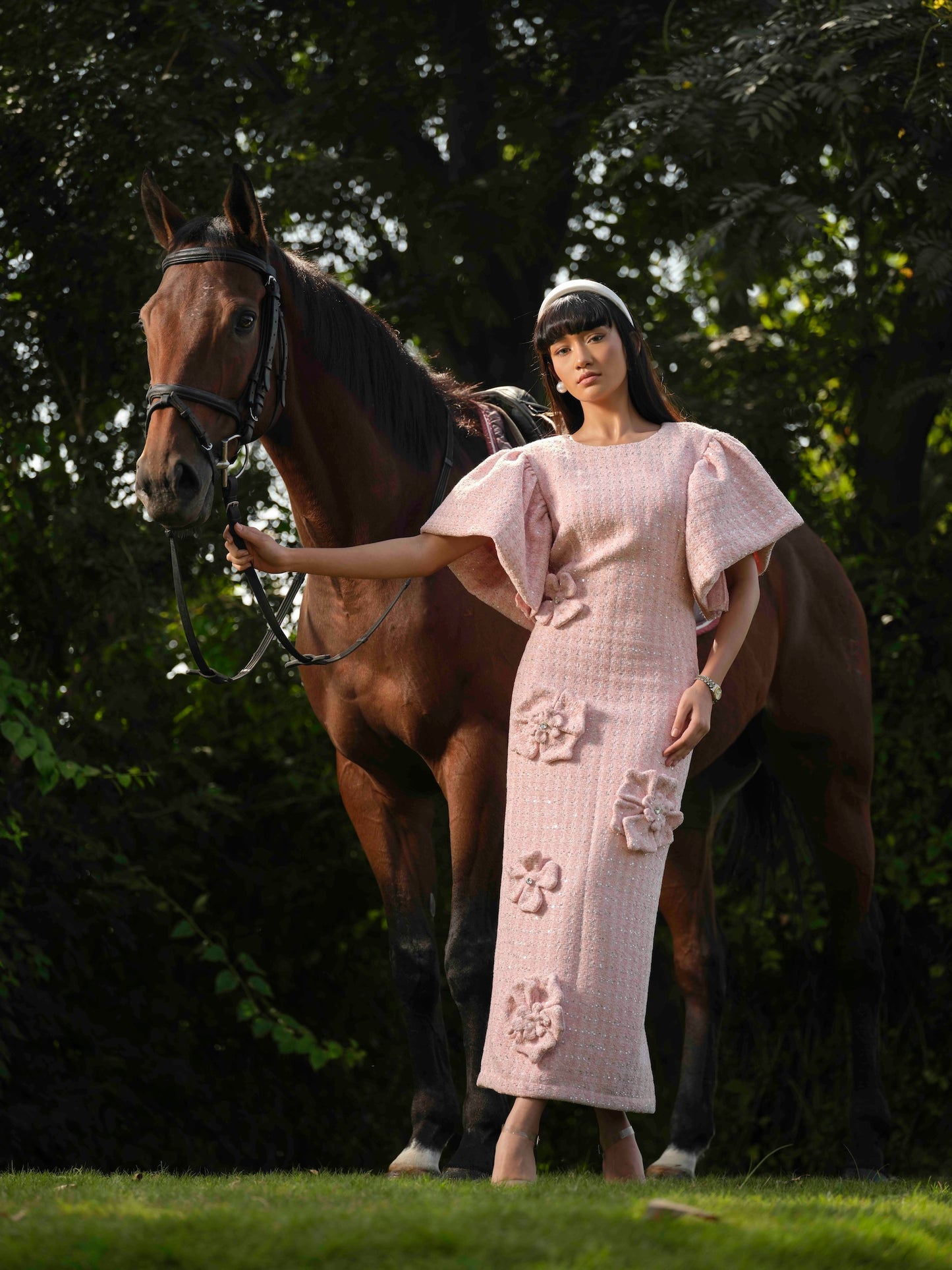 AURELIA- A Long dress with flower detailing.