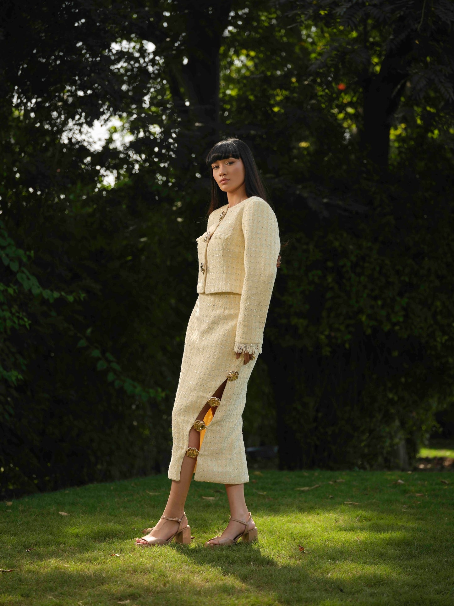 SERENE- Short jacket paired with detailed pencil fit skirt.