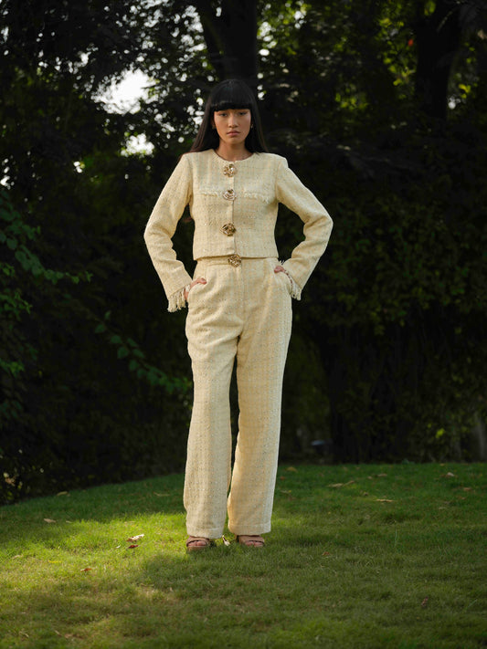 NOVARA- Short  Jacket paired with straight pants .