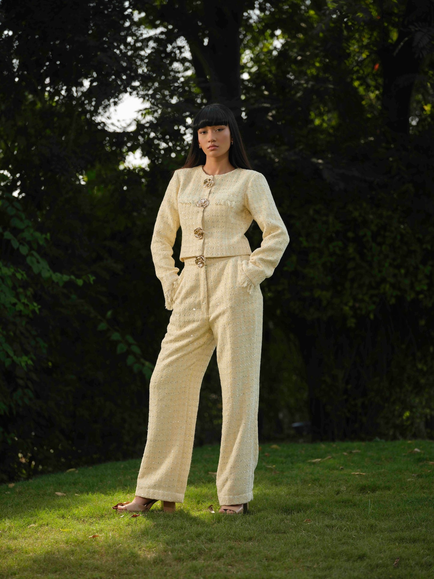 NOVARA- Short  Jacket paired with straight pants .