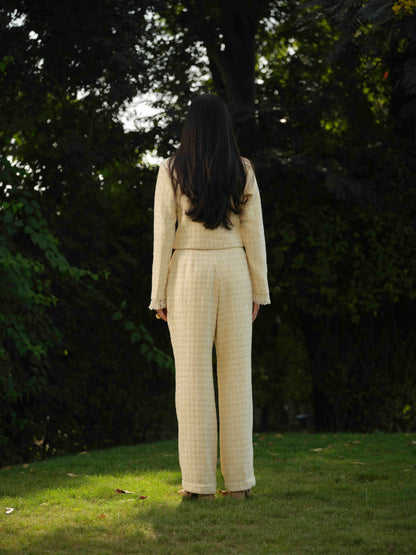 NOVARA- Short  Jacket paired with straight pants .