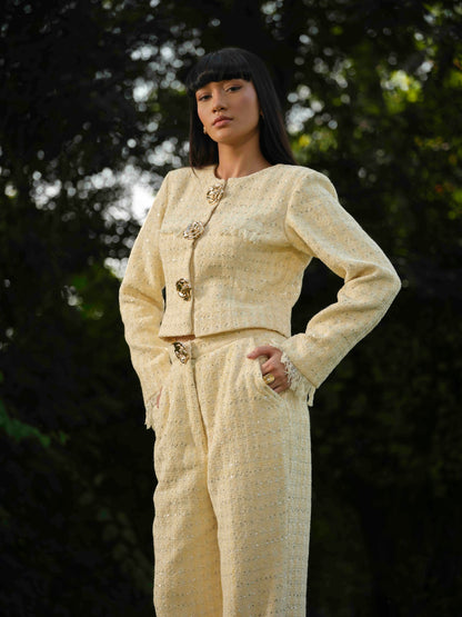 NOVARA- Short  Jacket paired with straight pants .