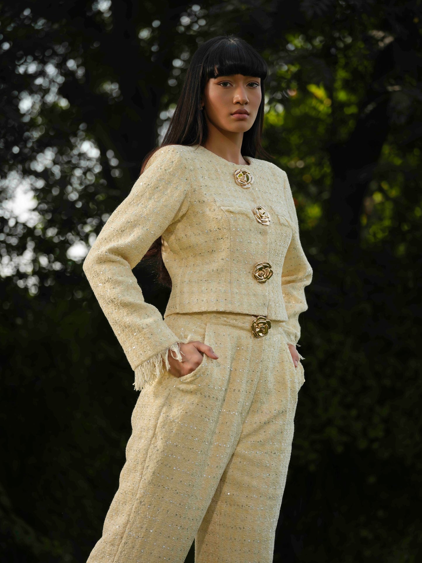 NOVARA- Short  Jacket paired with straight pants .