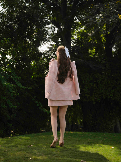 ELYSIA – A short dress with elegant flower detailing, paired with a stylish blazer.