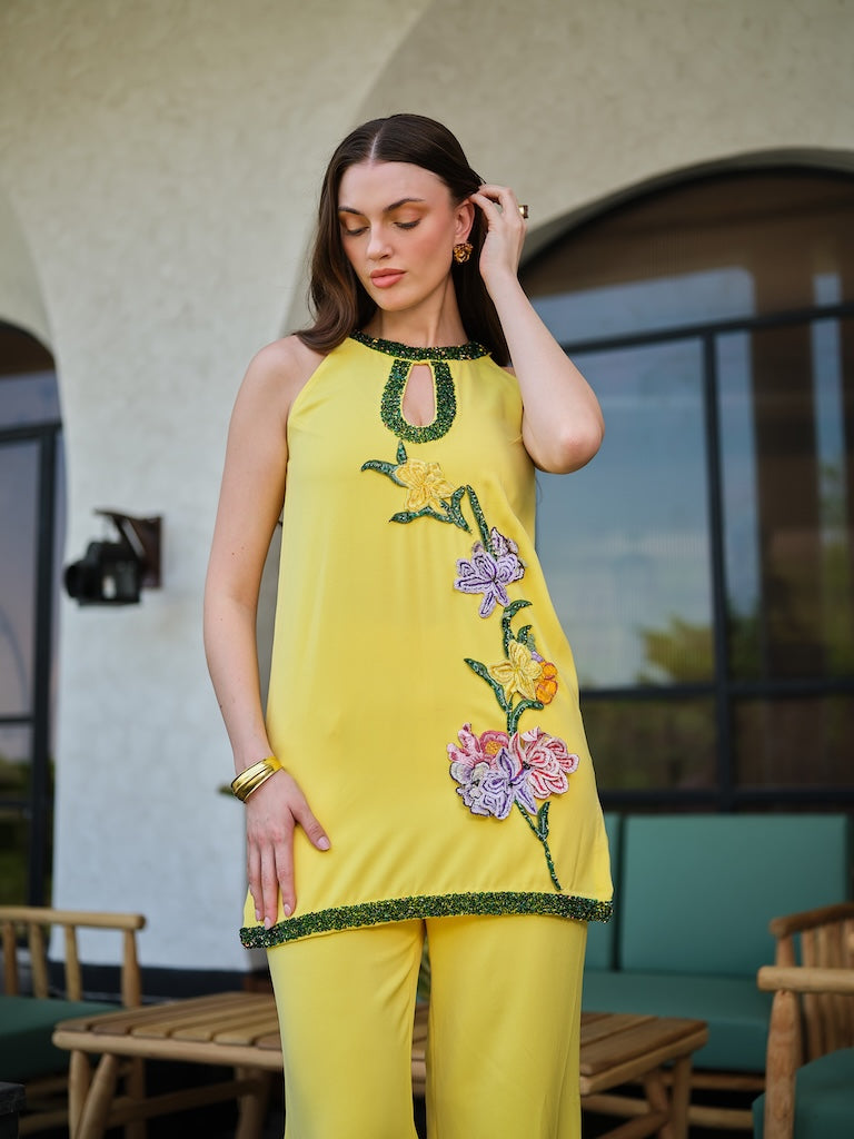 CITRUS-A bright yellow embroidered outfit with a beaded neckline and floral detailing.