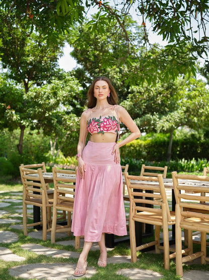 ROSELLE - A pink appliqué tie-up top paired with a fine pleated skirt.