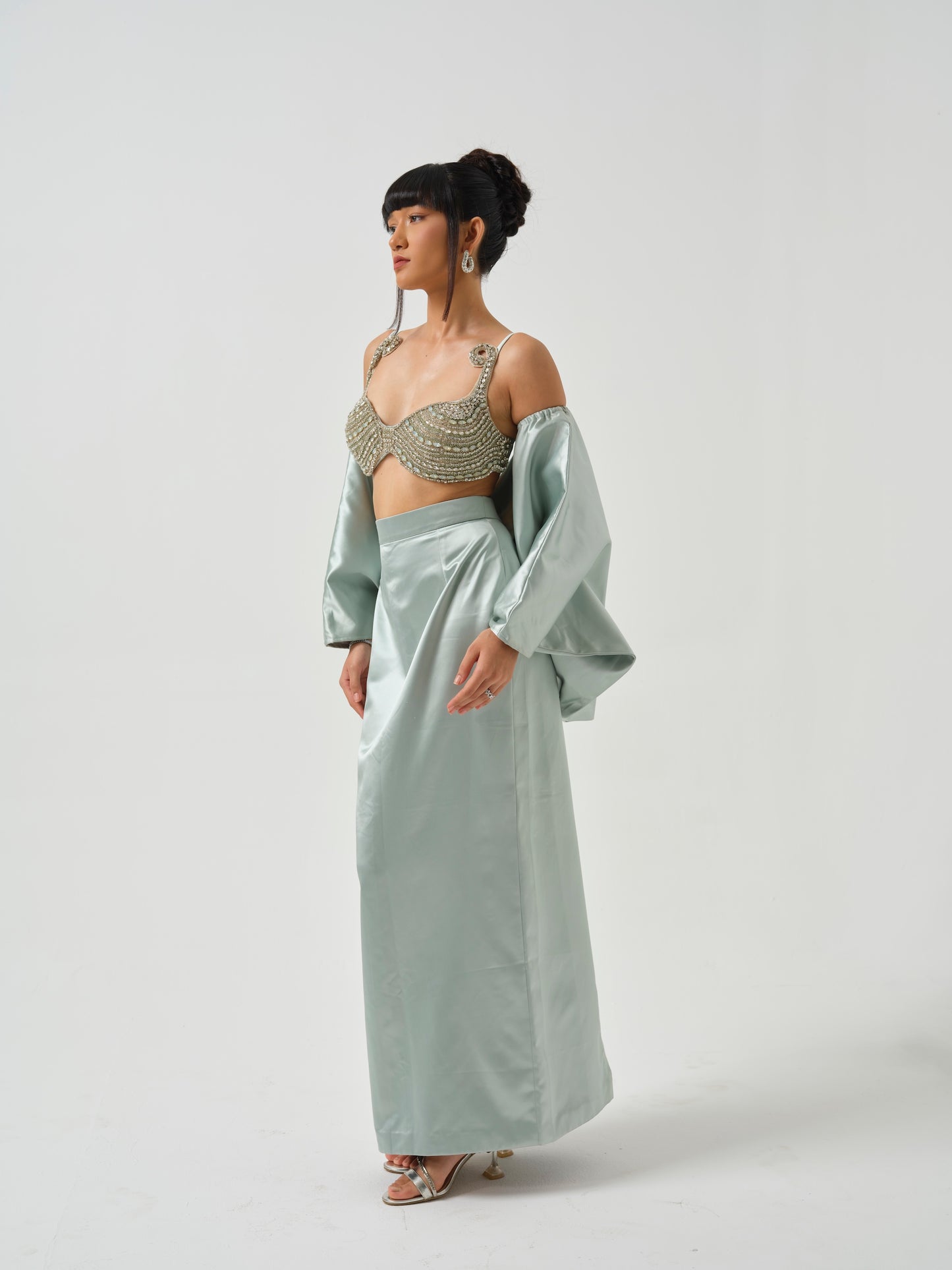 INAAYA- A heavily embroidered blouse paired with skirt and bow