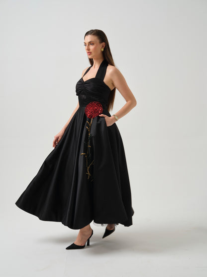 ELSORA- Long halter neck dress with flower detailing on flare