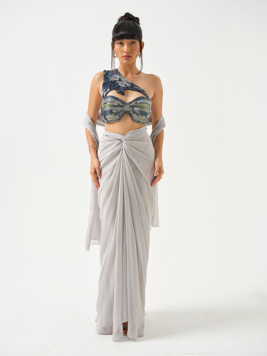 ZAHEEN- A heavily embroidered off shoulder top paired with drape skirt