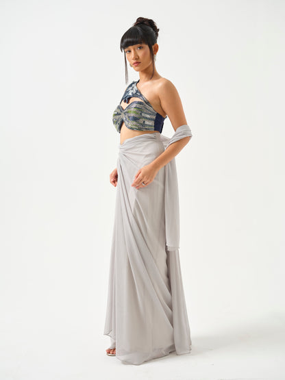 ZAHEEN- A heavily embroidered off shoulder top paired with drape skirt