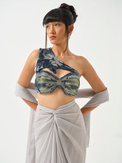 ZAHEEN- A heavily embroidered off shoulder top paired with drape skirt