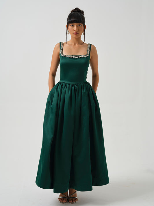 ELOWE -A T-length dress with stone detailing on neck.