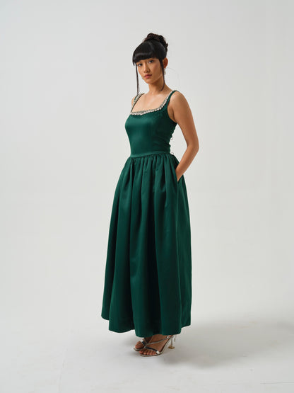 ELOWE -A T-length dress with stone detailing on neck.
