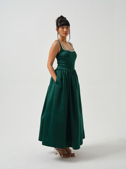 ELOWE -A T-length dress with stone detailing on neck.