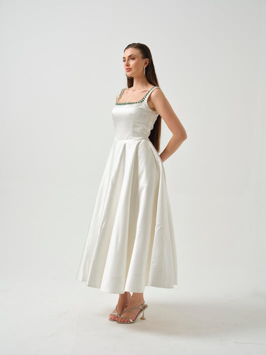 LILY- white T-length dress with stone detailing .