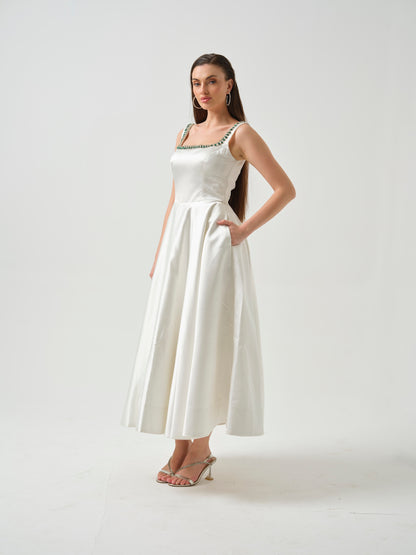 LILY- white T-length dress with stone detailing .