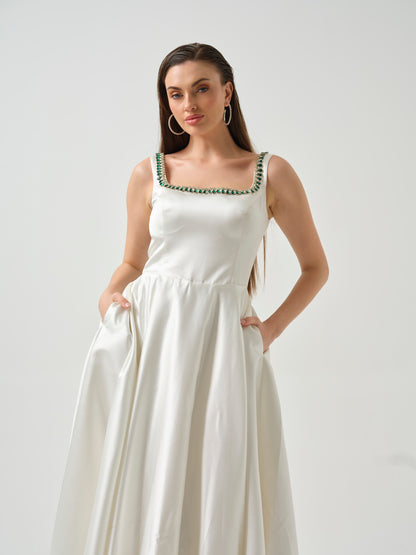 LILY- white T-length dress with stone detailing .