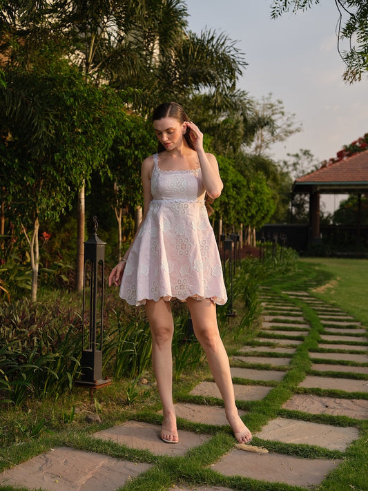 LIORA -A pink cutwork dress with a square neck and back cut-out.