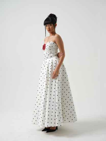 FLOSSY-A long corset dress with flower detailing.