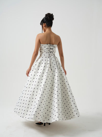 FLOSSY-A long corset dress with flower detailing.