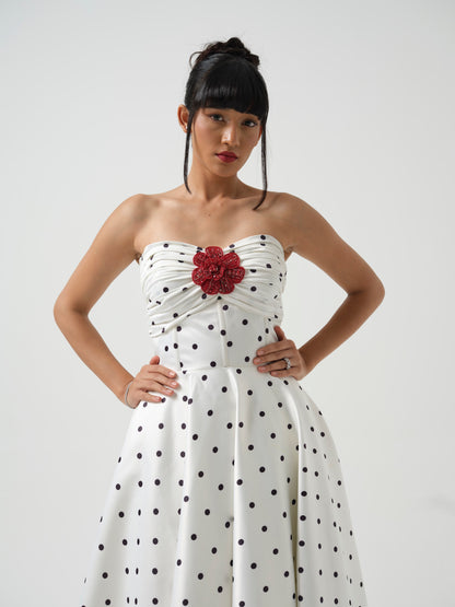 FLOSSY-A long corset dress with flower detailing.
