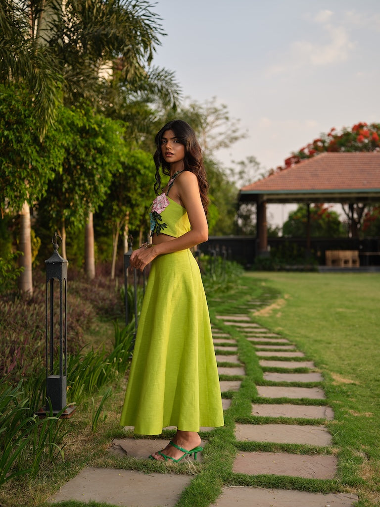 FLORIELLE - A teal green co-ord with floral and embroidered detailing paired with a tea-length
