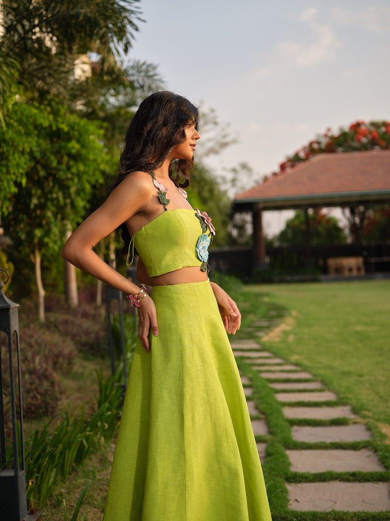 FLORIELLE - A teal green co-ord with floral and embroidered detailing paired with a tea-length