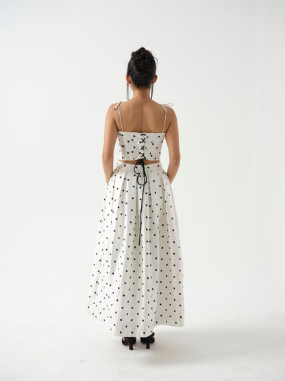 BLOOMIE- corset top paired it with tea length skirt.