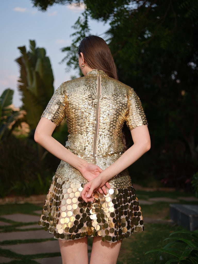 BELLEZA - A golden high-neck short dress fully adorned with intricate embroidery and elegant elbow-length sleeves.