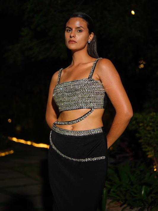 MIRALYN - A black co-ord set featuring a top adorned with intricate full stone handwork. Paired with a fitted skirt