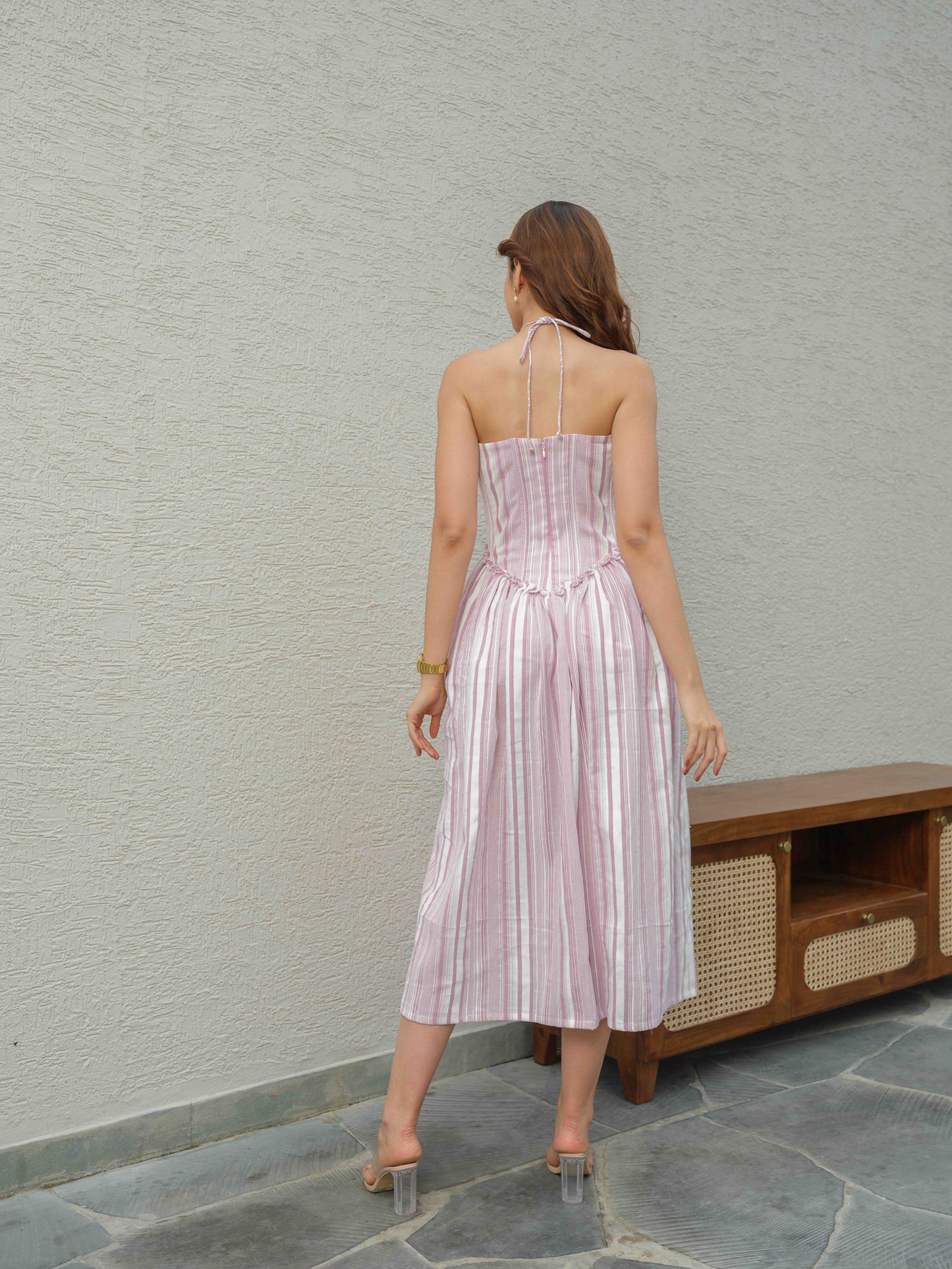 ZIME – A halterneck corset dress featuring fabric flower detailing on the top